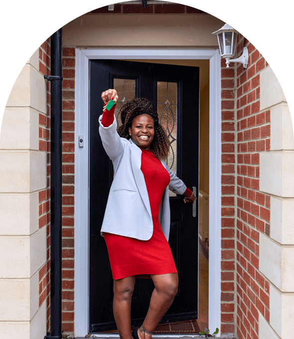 Woman celebrating new home with keys
