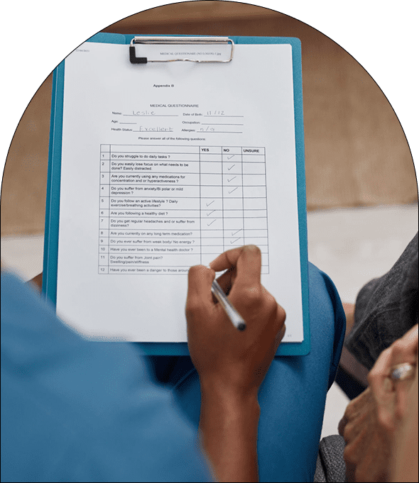Person filling out a medical questionnaire